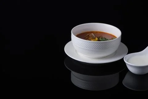 Dish on black background Stock Photos