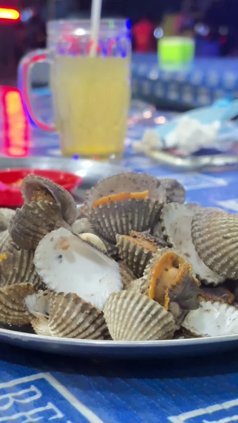 A dish of boiled and still hot virgin mussels Stock Footage 322978295