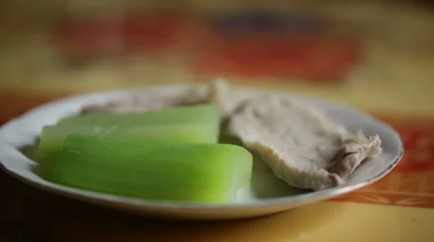 A dish of boiled vegetable and pork meat. Stock Footage 55710147