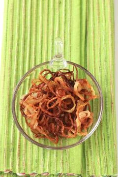 Dish of browned onion - studio shot Stock Photos