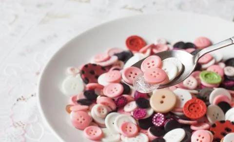 Dish of buttons Foto stock