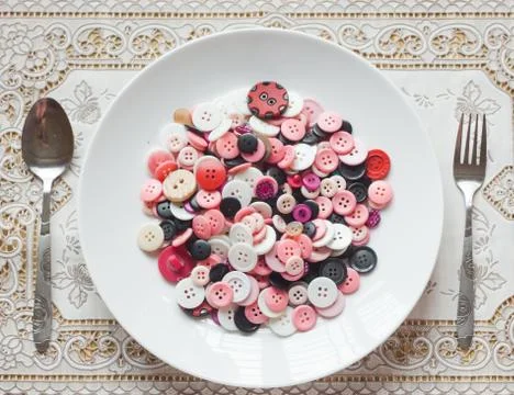 Dish of buttons Foto stock