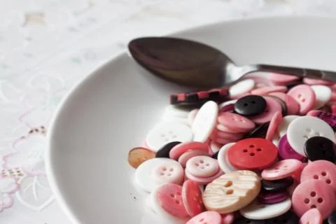 Dish of buttons Foto stock