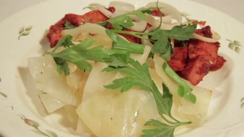 A dish of cabbage with roasted meat Stock Footage 70925897