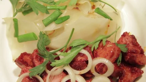 A dish of cabbage with roasted meat Stock Footage 70926352