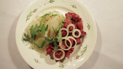 A dish of cabbage with roasted meat Stock Footage 70926380