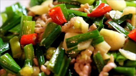 A dish called chive bud fried ground pork Stock Footage 38639235