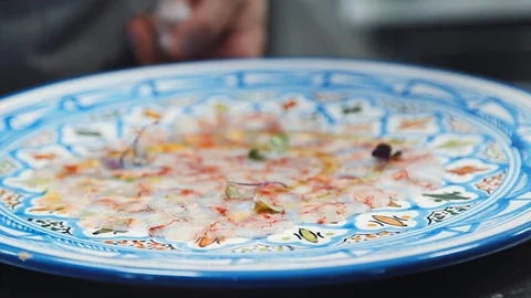 A dish of carpaccio of fish Stock Footage 114229962