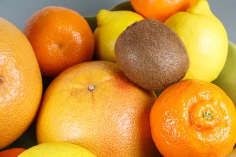 Dish of citrus on a table Stock Photos