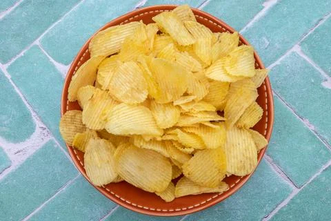 Dish of crisps on a table Stock Photos