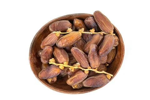 Dish of dates isolated Stock Photos