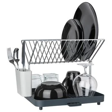 Dish drainer rack for kitchen counter. Dish drainer rack for wet ceramic plate Stock Photos