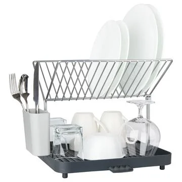 Dish drainer rack for kitchen counter. Dish drainer rack for wet ceramic plate Stock Photos