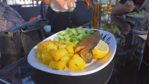 Dish with fish and vegetable garnish Video stock 112029844
