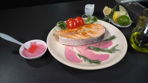 Dish fried red fish steak in a restaurant Видео 103399438