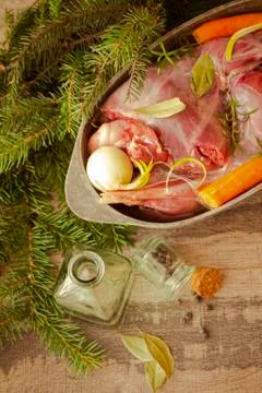 Dish with game hare and vegetables, russian cuisine, vertical image Stock Photos