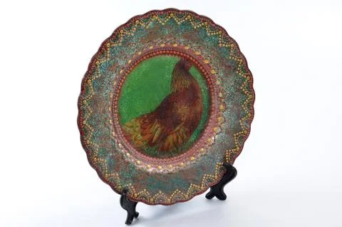 Dish of handwork on support Stock Photos