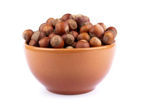 Dish with hazelnuts Stock Photos