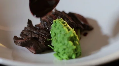Dish On Large White Plate. Chef Puts Spoonful Of Green Smoothie On Plate. Sliced Stock-Footage 120574815