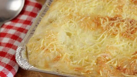 Dish of lasagna, close-up, on a table Foto stock