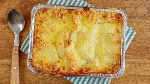 Dish of lasagna, close-up, on a table Foto stock