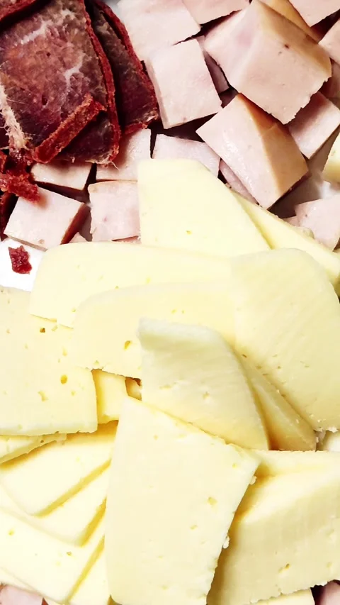 Dish with meat, and various cheeses. Vertical video Stock Footage 154805526