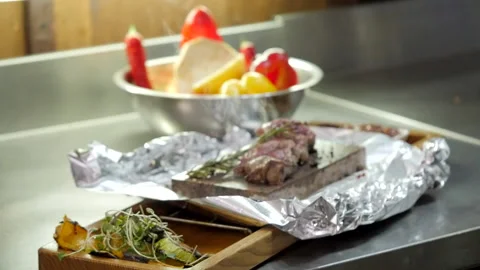 A Dish with Meat on the Cook's Table Stock Footage 132107739