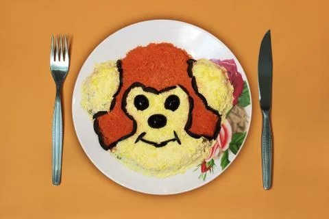 Dish, monkey, knife, fork Stock Photos