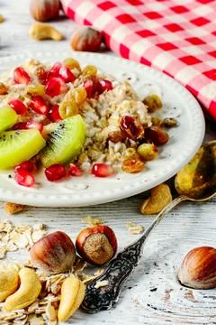 Dish of oat flakes Stock Photos