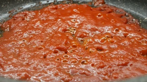 Dish of pasta cooked sauce with fresh tomato Stock Footage 82777030