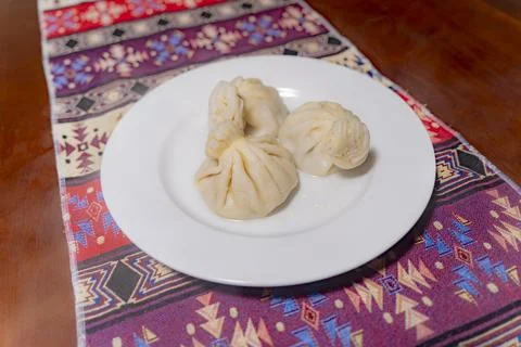 A dish on a plate. 스톡 사진