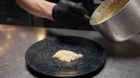 Dish prepared by hand in the kitchen Stock Footage 253880502