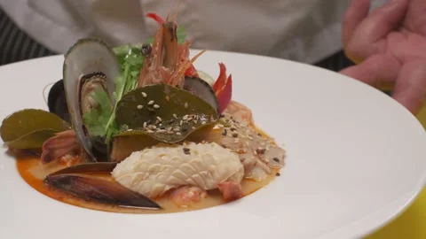 A dish with ready-made red fish, cucumbers, lemon, onions Stock Footage 231017438