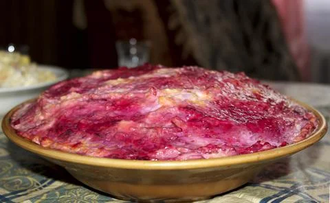 Dish with red beetroot salad "herring under a fur coat" Stock Photos