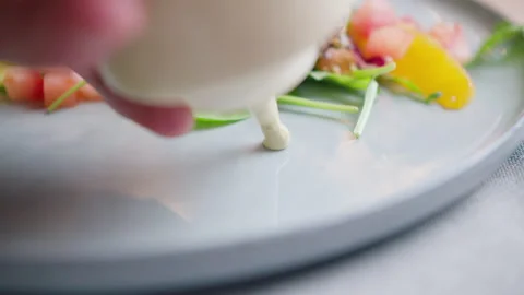 A dish in a restaurant, decorated with sauce. Macro shot. Stock Footage 131317265