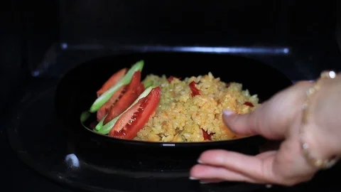 Dish of rice in the microwave Video stock 96422502