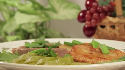 A dish of roasted potatoes with meat Stock Footage 70926601