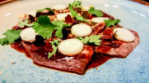 Dish with sauce. Photos