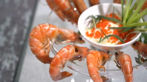 Dish of shrimp on a table in a restaurant Video stock 103475499
