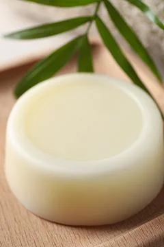 Dish with solid shampoo bar, closeup view 写真素材