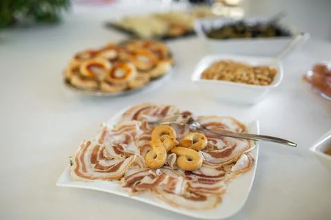 Dish on a square plate on the wedding table Stock Photos