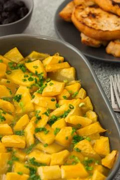 Dish with stewed pumpkin Stock Photos