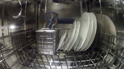 Dish washing machine with water streams, inside view Stock Footage 47436221