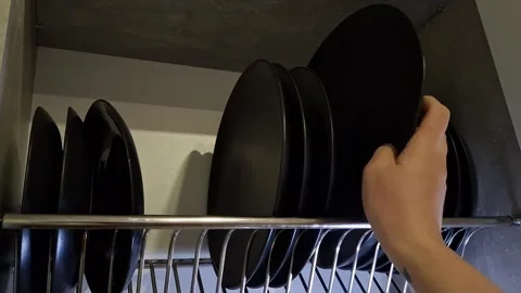 Dishes in the cupboard Stock Footage 348132889