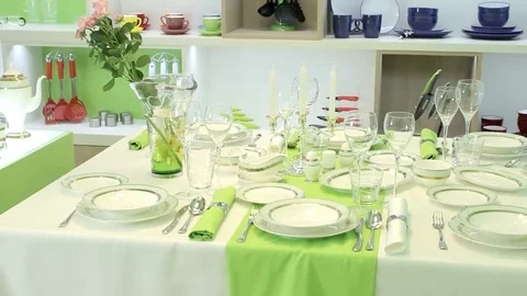 Dishes decorated table Stock Footage 69146733