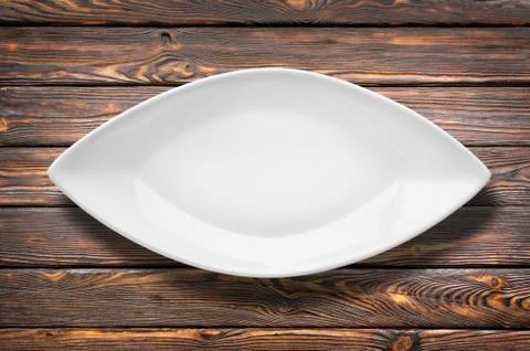 Dishes for fish on a table Stock Photos