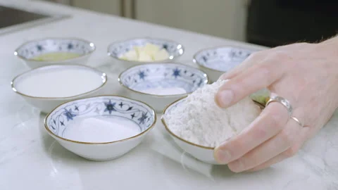 Dishes with flour, raw egg, sugar, milk, melted butter. Stock Footage 275892501
