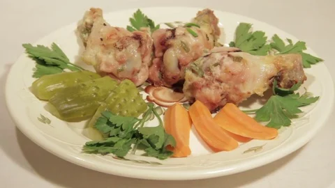 Dishes portion from chicken wings with vegetables Stock Footage 71016670