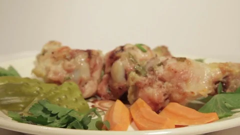 Dishes portion from chicken wings with vegetables Stock Footage 71016729
