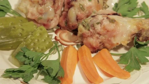 Dishes portion from chicken wings with vegetables Stock Footage 71016879